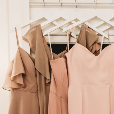 Image of bridesmaid dresses on hanger that links to Marien Mae's bridesmaid dresses